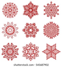 Vector abstract design in red colors. Set of red snowflakes and dots on a white background.