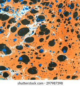 Vector abstract ebru background with bright orange, blue and dark color spots