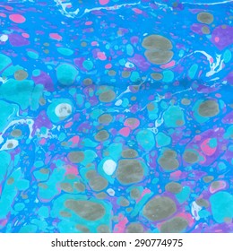 Vector abstract ebru blue color background with green and pink spots