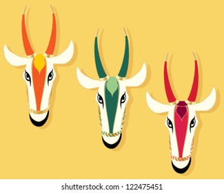 a vector abstract in eps 10 format illustration of three jain cow heads in different colors on a mustard color background with space for text