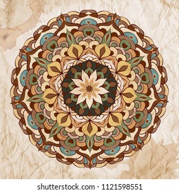 Vector abstract ethnic mandala motif on a grunge background.
