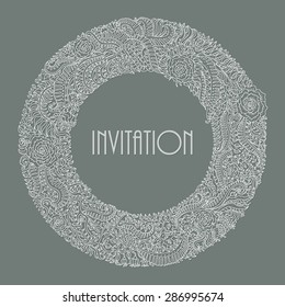 Vector abstract floral wreath from silver grey hand drawn doodle fantasy leaves and flowers on a dark green grey background