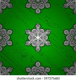Vector abstract floral wreath from white doodle fantasy leaves and flower on a green background. Hand drawn decorative frame, album cover, invitation, greeting card, vintage style.