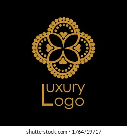 Vector abstract flower ring golden shape on black background. Emblem, logo, logotype, badge for design of natural products, flower shop, cosmetics, ecology concepts, health, spa, beauty center.