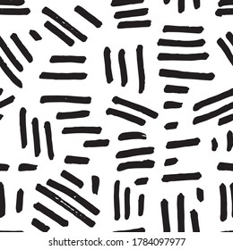 Vector abstract geometric irregular paint stroke brush pattern in black and white. Modern grunge design. Vivid, hand drawn, in motion, modern brush design on white background. Surface pattern design.