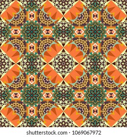 Vector abstract geometric kaleidoscopic mandala design symbol - symmetric. Seamless pattern from mandalas painted in orange, brown and beige colors.