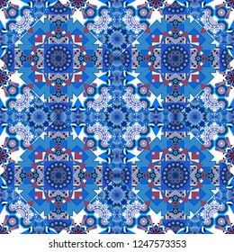 Vector abstract geometric kaleidoscopic mandala design symbol - symmetric. Seamless pattern from mandalas painted in white, purple and blue colors.
