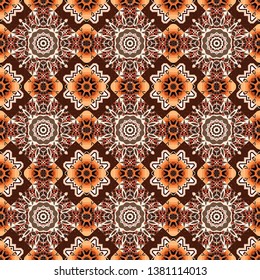 Vector abstract geometric kaleidoscopic mandala design symbol - symmetric. Seamless pattern from mandalas painted in brown, beige and orange colors.
