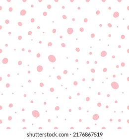 Vector abstract hand drawn dotted seamless patterns. Pink dots Isolated on a white background. Pink polka dots.Simple geometric shape