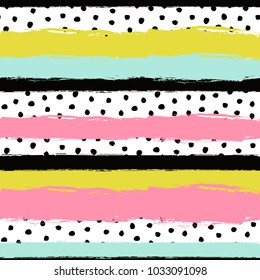 Vector abstract hand drawn seamless pattern with striped geometric brush painted elements and polka dots. Textured background for poster, card, textile, wallpaper template.