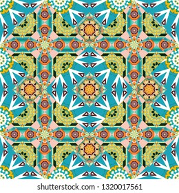 Vector abstract holographic seamless pattern in yellow, white and blue colors. Vibrant style pattern. Geometric repeating wallpaper. Mandalas on the background.