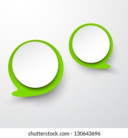 Vector abstract illustration of white and green paper round speech bubbles on grey background. Eps10.