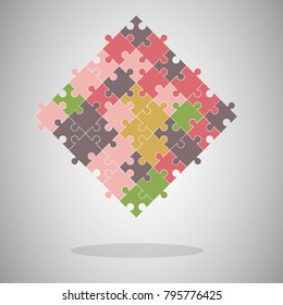 Vector abstract jigsaw colorful background made from puzzle pieces.