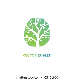 Vector abstract logo design template and emblem - growth and development concept - green tree with leaves and fruits - growing tree 