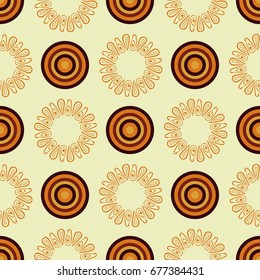 Vector abstract mandala in an African style. Seamless pattern on a yellow background. textile print
