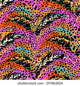 Vector abstract pattern inspired by tropical birds, parrots wings, leaves, foliage. Seamless feather texture hand drawn in bright colors with splattered dots. Bold print for winter fall fashion