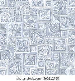 Vector abstract seamless doodle pattern. Blue white hand drawn geometrical ornaments, wavy stripes and fantasy leaves with flower.Textile patchwork vintage American Indian, Aztec, Eskimo light print.