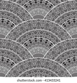 Vector abstract seamless geometrical background with fish scale layout from dark grey and white fan shaped ornate elements with ethnic patterns. Art deco wallpaper, wrapping, batik paint