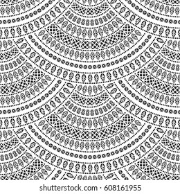 Vector abstract seamless geometrical background from dark black and white fan shaped ornate elements with ethnic patterns. Wallpaper, textile print, batik, wrapping paper, album cover, page fill