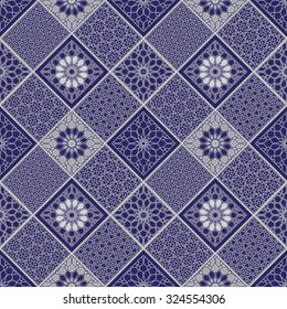 Vector abstract seamless patchwork background from dark blue and light grey geometrical Moroccan traditional arabesque patterns, ornaments, stylized flowers and lacy hexagonal stars. Textile print.