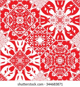 Vector abstract seamless patchwork background from red and white ornaments. Ornament of various shapes. Textile design, batik paint.