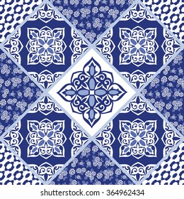 Vector abstract seamless patchwork pattern with geometric and floral  ornaments, stylized flowers, dots, snowflakes and lace. Vintage boho style.