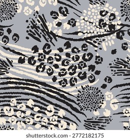 Vector abstract seamless pattern. Animal skin background with black and white spots on light blue backdrop. Abstract exotic safari texture. 