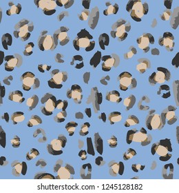 Vector abstract seamless pattern. Doodle figures and flowers imitation. Leopard skin texture illusion. 