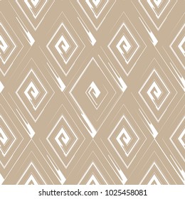 Vector abstract seamless pattern with drawn by brush rhombuses.Modern stylish texture.Light brown and white
