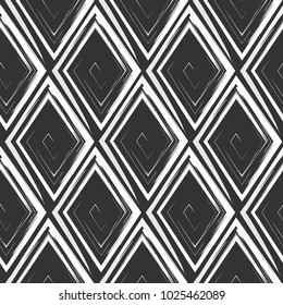 Vector abstract seamless pattern with drawn by brush rhombuses.Modern stylish texture.Black and white