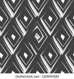 Vector abstract seamless pattern with drawn by brush rhombuses.Modern stylish texture.Black and white