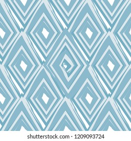 Vector abstract seamless pattern with drawn by brush rhombuses.Modern stylish texture.Blue and white