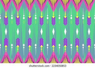 Vector - Abstract seamless pattern of geometric ethnic pattern. Pink, yellow, Purple and green color. Colorful image. Can be use for print, fabric, paper, silk satin, dress, clothing.