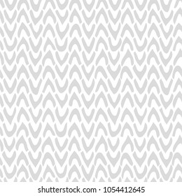 Vector Abstract seamless pattern with hand drawn chevron. Ticks with rough edges in light-gray color on white background. Neutral Trendy graphic design.
