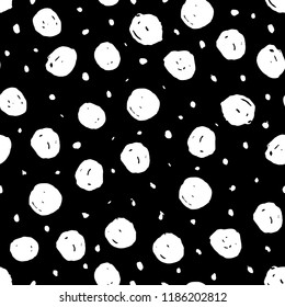 Vector abstract seamless pattern with hand drawn dots. 