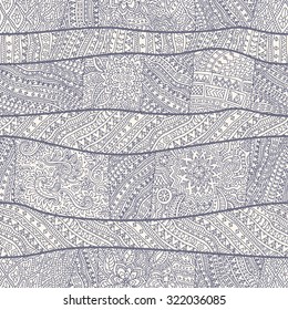 Vector abstract seamless pattern from indigo blue and light beige hand drawn outline geometrical ornaments, wavy stripes and fantasy leaves with flower.Textile wavy patchwork print.Coloring book page