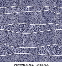 Vector abstract seamless pattern from indigo blue and light beige hand drawn outline geometrical ornaments, wavy stripes and fantasy star, flower with leaves. Textile patchwork. Wrapping paper