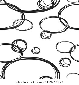 Vector abstract seamless pattern with lots of circles on white background. Round decorative hand drawn graphic elements. Bubbles drawn with pen or pencil. Illustration for the design of wrapping paper