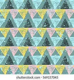 Vector abstract seamless pattern with triangles in memphis style