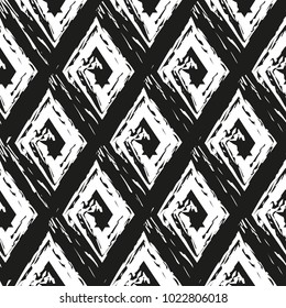 Vector abstract seamless pattern whit drawn by brush rhombuses.Modern stylish texture.Black and white