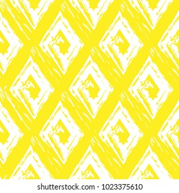 Vector abstract seamless pattern whit drawn by brush rhombuses.Modern stylish texture.Yellow and white