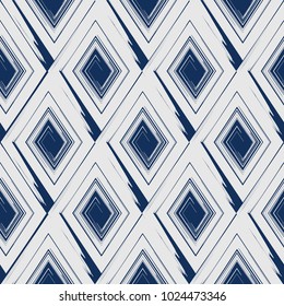 Vector abstract seamless pattern whit drawn by brush rhombuses.Modern stylish texture.Blue background