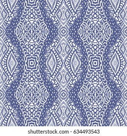 Vector abstract seamless pattern from white hand drawn curly stripes and spots on a dark indigo blue background. Ikat print. 