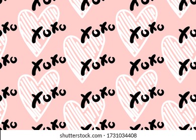 Vector abstract seamless XOXO pattern. Pastel beige background with white hearts and black letters. Trendy print design for textile, wrapping paper, wedding backdrops, Valentine's Day concepts etc.