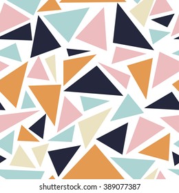 Vector abstract triangles seamless pattern with many colorful triangular shapes.  Can be used for wallpaper, pattern fills, web page background, surface textures.