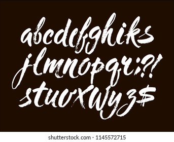 Vector Acrylic Brush Style Hand Drawn Alphabet Font. Calligraphy alphabet on a black background. Ink hand lettering.