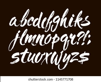 Vector Acrylic Brush Style Hand Drawn Alphabet Font. Calligraphy alphabet on a black background. Ink hand lettering.