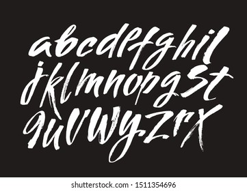 Vector Acrylic Brush Style Hand Drawn Alphabet Font. Calligraphy alphabet on a black background. Ink hand lettering.