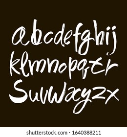 Vector Acrylic Brush Style Hand Drawn Alphabet Font. Calligraphy alphabet on a black background. Ink hand lettering.