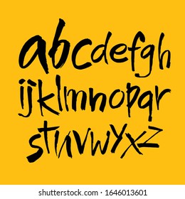 Vector Acrylic Brush Style Hand Drawn Alphabet Font. Calligraphy alphabet on a yellow background. Ink hand lettering.